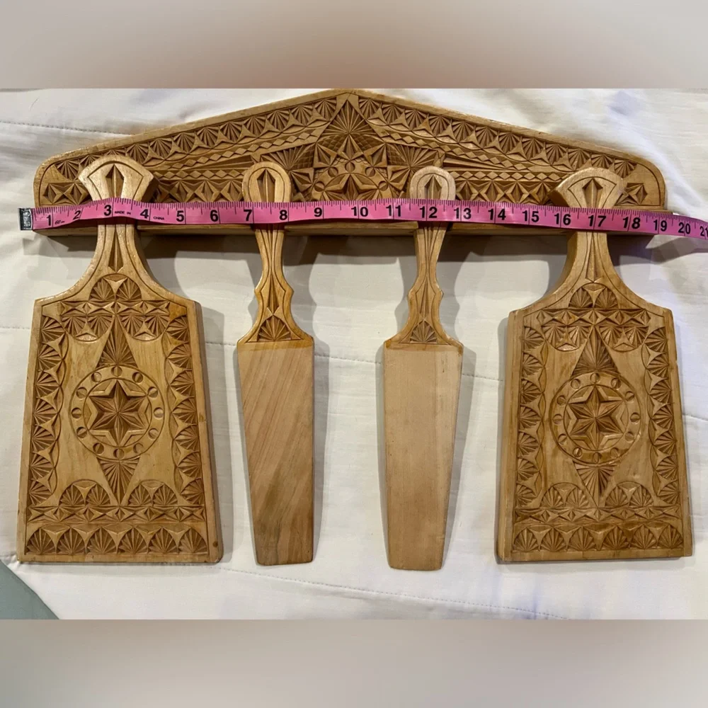 Handcrafted Wooden Wall Decor with Intricate Carvings
